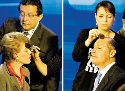 Marta Suplicy (PT) e Geraldo Alckmin (PSDB) so maquiados no intervalo do debate de TV entre candidatos na noite de ontem