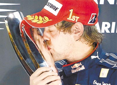 O alemo Sebastian Vettel, 23, aps a vitria em Abu Dhabi
