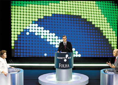 Dilma Rousseff (PT) e Jos Serra (PSDB) durante o debate <b>Folha</b>/RedeTV!, mediado pelo jornalista Kennedy Alencar